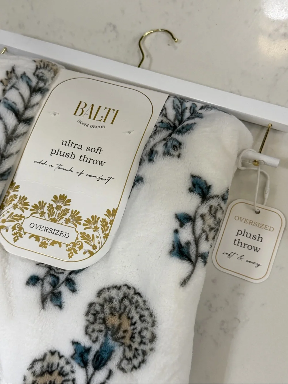 White Floral Plush Throw Blanket with Blue and Tan Accents
